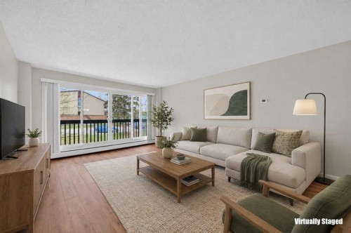 602-8948 Elbow Drive Sw, Calgary, AB - Indoor Photo Showing Living Room