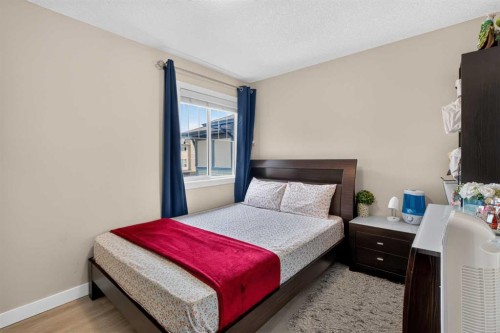 45 Saddlestone Drive Ne, Calgary, AB - Indoor Photo Showing Bedroom