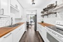 84-6915 Ranchview Drive Nw, Calgary, AB  - Indoor Photo Showing Kitchen With Double Sink 