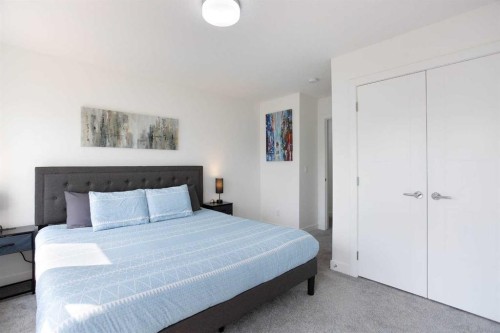91 Copperhead Grove Se, Calgary, AB - Indoor Photo Showing Bedroom