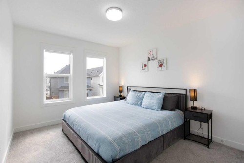 91 Copperhead Grove Se, Calgary, AB - Indoor Photo Showing Bedroom