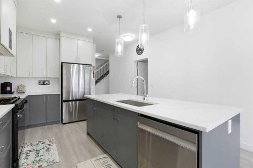 91 Copperhead Grove Se, Calgary, AB - Indoor Photo Showing Kitchen With Upgraded Kitchen