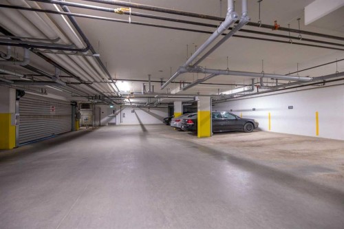 3104-3727 Sage Hill Drive Nw, Calgary, AB - Indoor Photo Showing Garage