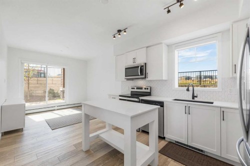 3104-3727 Sage Hill Drive Nw, Calgary, AB - Indoor Photo Showing Kitchen With Upgraded Kitchen