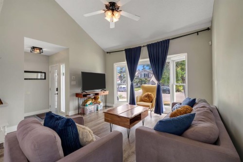 44 Strathclair Rise Sw, Calgary, AB - Indoor Photo Showing Living Room