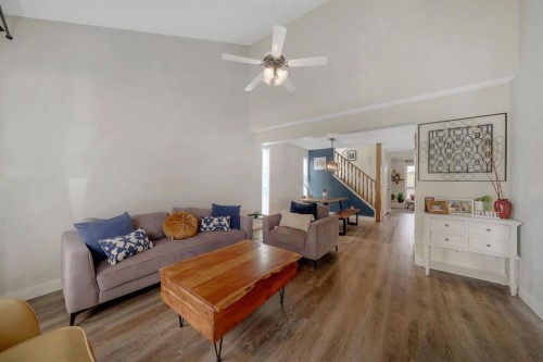 44 Strathclair Rise Sw, Calgary, AB - Indoor Photo Showing Living Room