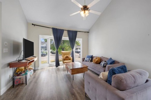 44 Strathclair Rise Sw, Calgary, AB - Indoor Photo Showing Living Room