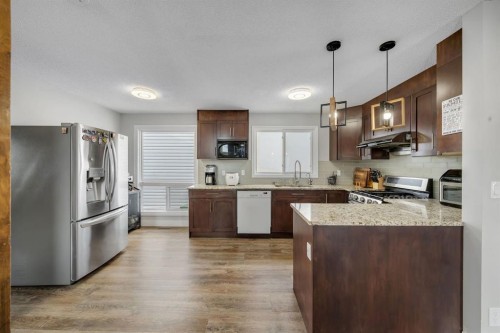 44 Strathclair Rise Sw, Calgary, AB - Indoor Photo Showing Kitchen With Stainless Steel Kitchen With Upgraded Kitchen