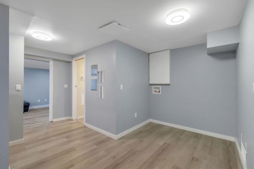44 Strathclair Rise Sw, Calgary, AB - Indoor Photo Showing Other Room