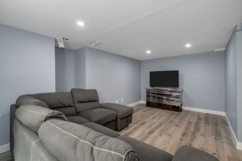 44 Strathclair Rise Sw, Calgary, AB - Indoor Photo Showing Basement