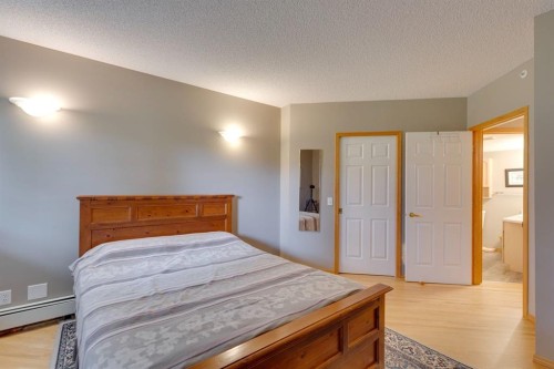 3109-3109 Hawksbrow Point Nw, Calgary, AB - Indoor Photo Showing Bedroom