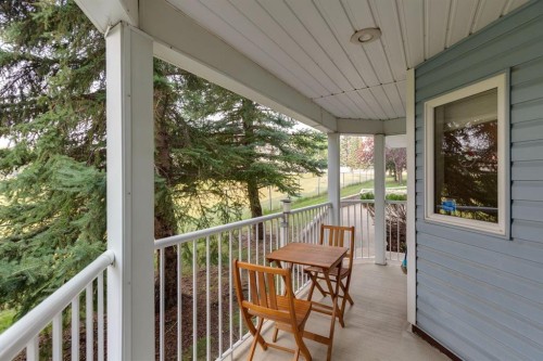 3109-3109 Hawksbrow Point Nw, Calgary, AB - Outdoor With Deck Patio Veranda With Exterior