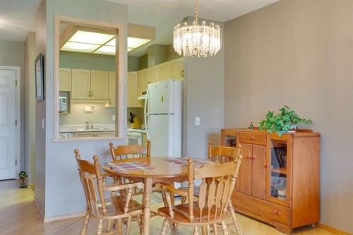 3109-3109 Hawksbrow Point Nw, Calgary, AB - Indoor Photo Showing Dining Room
