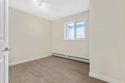 1103-1103 Hawksbrow Point Nw, Calgary, AB - Indoor Photo Showing Other Room