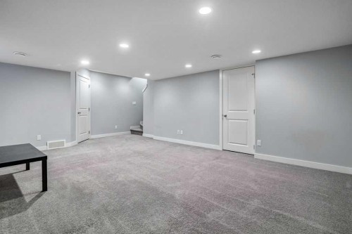 22 West Coach Manor Sw, Calgary, AB - Indoor Photo Showing Other Room