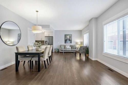 22 West Coach Manor Sw, Calgary, AB - Indoor Photo Showing Dining Room