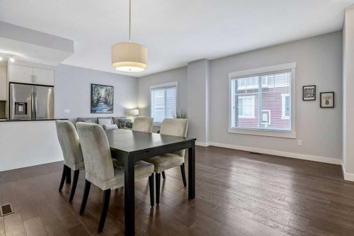 22 West Coach Manor Sw, Calgary, AB - Indoor Photo Showing Dining Room