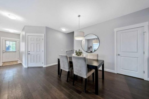 22 West Coach Manor Sw, Calgary, AB - Indoor Photo Showing Dining Room