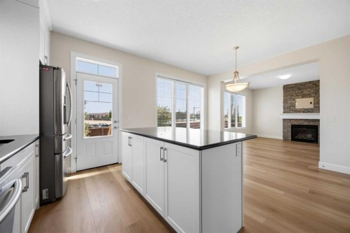 596 Windbrook Heights, Airdrie, AB - Indoor Photo Showing Kitchen With Upgraded Kitchen
