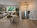 215 Penbrooke Way Se, Calgary, AB  - Indoor Photo Showing Living Room 