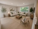 215 Penbrooke Way Se, Calgary, AB  - Indoor Photo Showing Living Room 