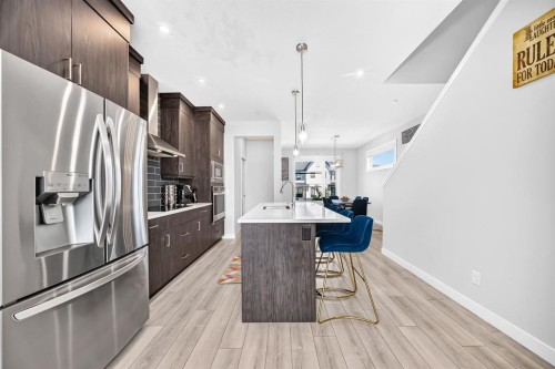 129 Calhoun Common Ne, Calgary, AB - Indoor Photo Showing Kitchen With Stainless Steel Kitchen
