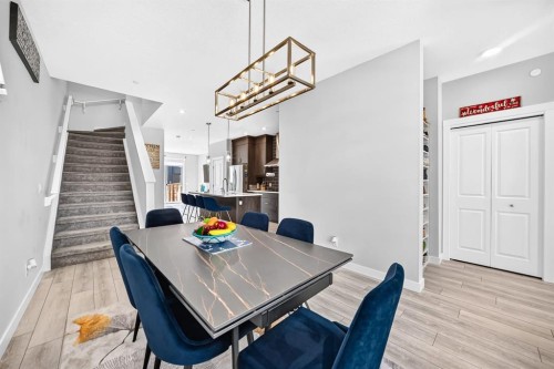 129 Calhoun Common Ne, Calgary, AB - Indoor Photo Showing Dining Room