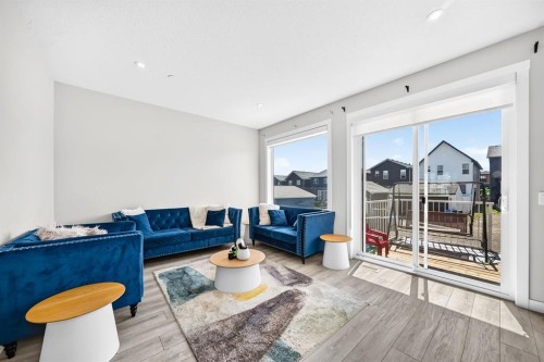 129 Calhoun Common Ne, Calgary, AB - Indoor Photo Showing Living Room