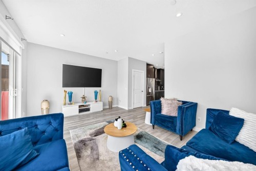 129 Calhoun Common Ne, Calgary, AB - Indoor Photo Showing Living Room