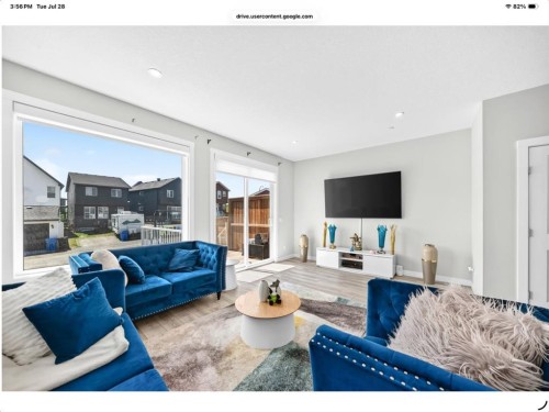 129 Calhoun Common Ne, Calgary, AB - Indoor Photo Showing Living Room