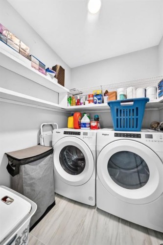 129 Calhoun Common Ne, Calgary, AB - Indoor Photo Showing Laundry Room