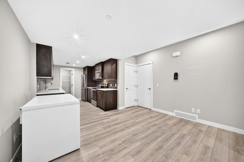 129 Calhoun Common Ne, Calgary, AB - Indoor Photo Showing Laundry Room