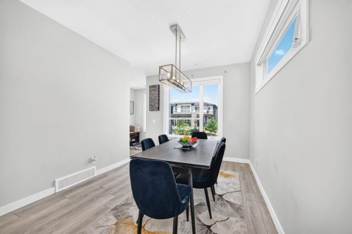 129 Calhoun Common Ne, Calgary, AB - Indoor Photo Showing Dining Room