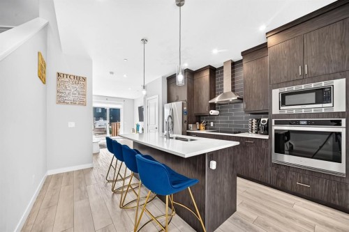 129 Calhoun Common Ne, Calgary, AB - Indoor Photo Showing Kitchen With Stainless Steel Kitchen With Upgraded Kitchen