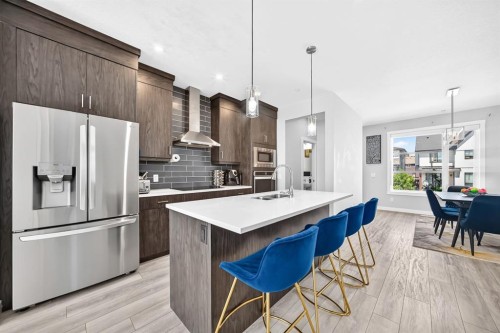 129 Calhoun Common Ne, Calgary, AB - Indoor Photo Showing Kitchen With Stainless Steel Kitchen With Upgraded Kitchen