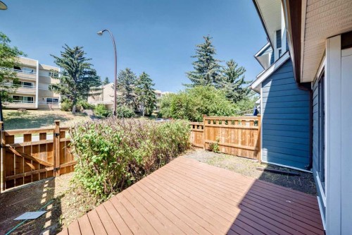 1-208 Grier Terrace Ne, Calgary, AB - Outdoor With Deck Patio Veranda