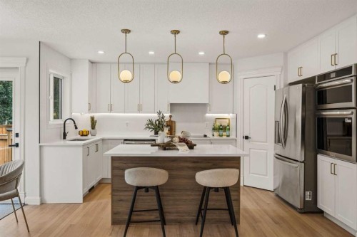 156 Strathridge Place Sw, Calgary, AB - Indoor Photo Showing Kitchen With Upgraded Kitchen
