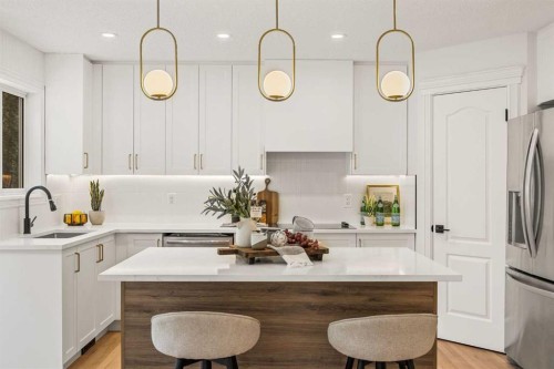 156 Strathridge Place Sw, Calgary, AB - Indoor Photo Showing Kitchen With Upgraded Kitchen