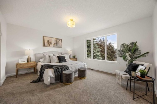 156 Strathridge Place Sw, Calgary, AB - Indoor Photo Showing Bedroom