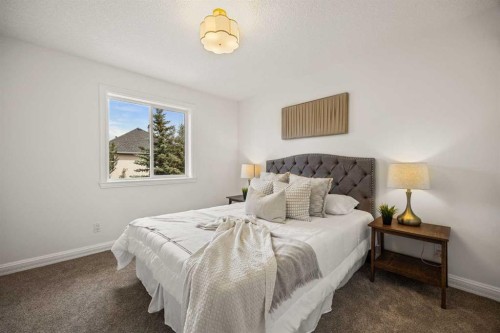 156 Strathridge Place Sw, Calgary, AB - Indoor Photo Showing Bedroom