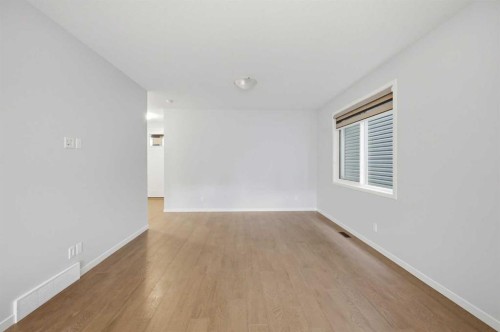 156 Seton Villas Se, Calgary, AB - Indoor Photo Showing Other Room