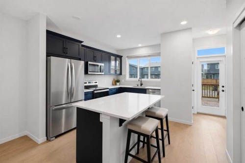 156 Seton Villas Se, Calgary, AB - Indoor Photo Showing Kitchen With Upgraded Kitchen