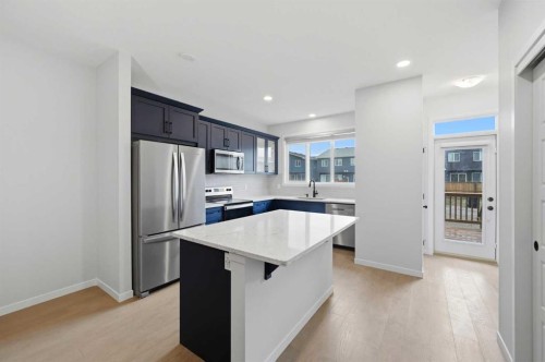 156 Seton Villas Se, Calgary, AB - Indoor Photo Showing Kitchen With Upgraded Kitchen