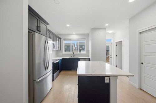 156 Seton Villas Se, Calgary, AB - Indoor Photo Showing Kitchen With Upgraded Kitchen