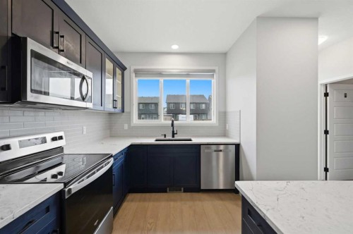 156 Seton Villas Se, Calgary, AB - Indoor Photo Showing Kitchen With Upgraded Kitchen