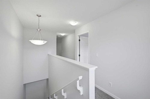 156 Seton Villas Se, Calgary, AB - Indoor Photo Showing Other Room