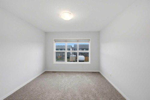 156 Seton Villas Se, Calgary, AB - Indoor Photo Showing Other Room