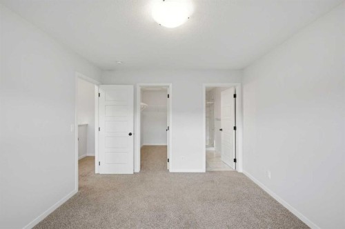 156 Seton Villas Se, Calgary, AB - Indoor Photo Showing Other Room