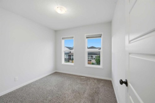156 Seton Villas Se, Calgary, AB - Indoor Photo Showing Other Room