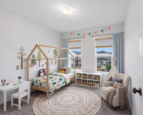 156 Seton Villas Se, Calgary, AB - Indoor Photo Showing Bedroom